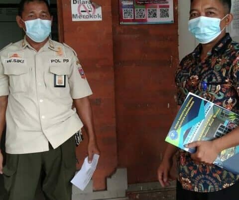 Pemasangan media informasi luar ruangan berupa Aklirik “KRISNA” di Kantor Satpol PP Kab. Karangasem